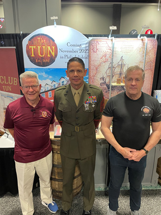 Sergeant Major Carlos A. Ruiz visits with Foundation Board Member Ken Hopper and President and Founder Pat Dailey at the Modern Day Marine expo.